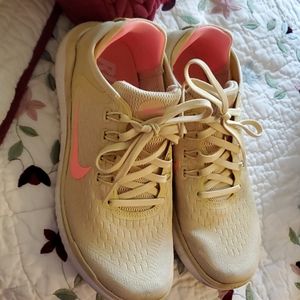 Yellow and orange Nike sneakers